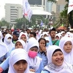 Buruh wanita ikut dalam Aksi demo menolak upah murah. (Foto: Fajrul Islam/SJ)
